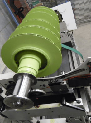 Reconditioned rotor mounted for machining and dynamic balancing