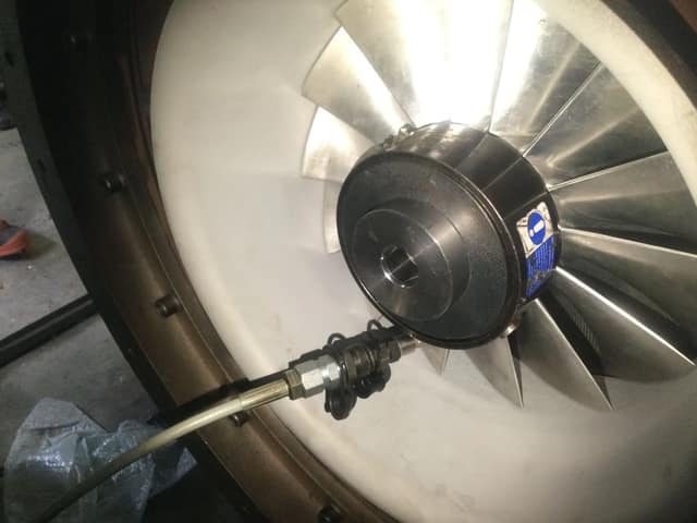 Newly manufactured high-speed impeller installed inside the rebuilt blower