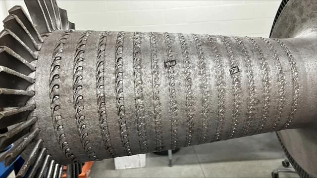 Brown Boveri DGSS rotor with the sheared blade stubs still in the grooves after blasting