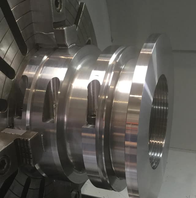 Newly manufactured stuffing box machined in-house by reverse engineering the original part