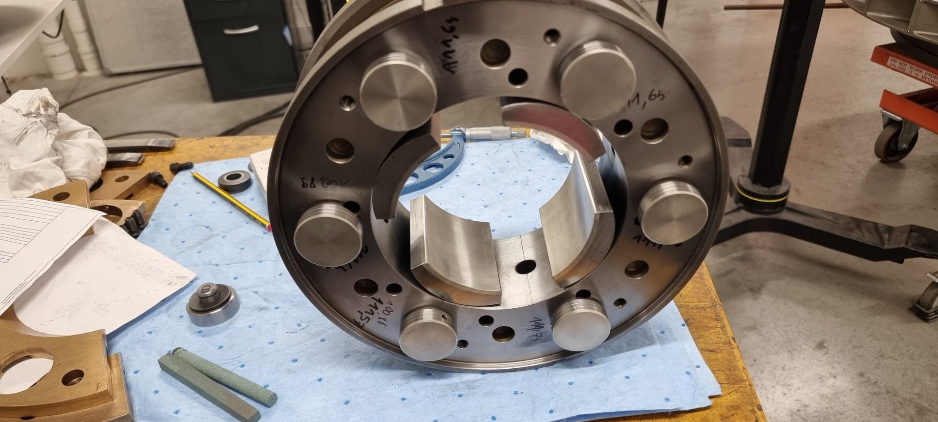 Bearing component on the CNC machine during in-house manufacturing