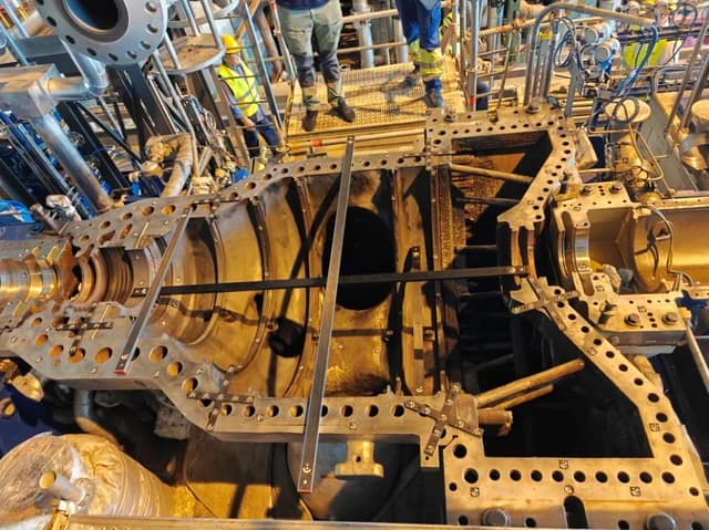 Photogrammetry setup on the opened MAN Turbo MARC 4 casing with reference markers and scale bars