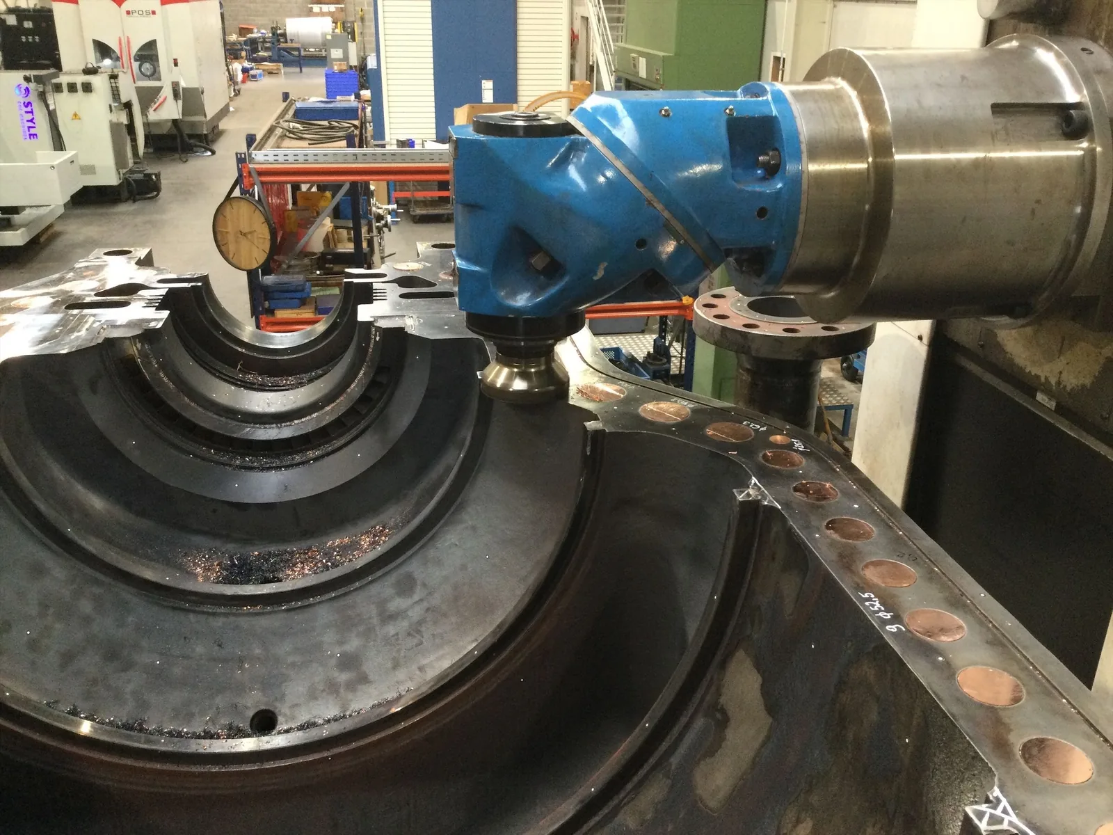 Machining the MAN Turbo MARC 4 split line after laser cladding, with copper plugs protecting the holes